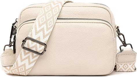 cream designer cross body bag